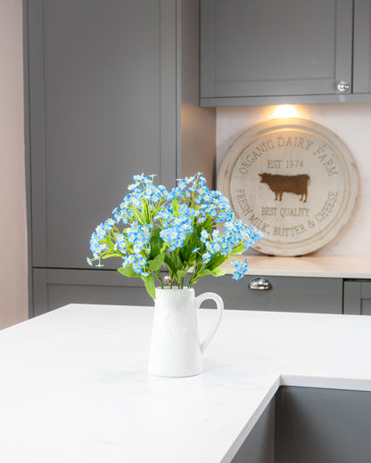 Forget Me Nots in Ceramic Jug