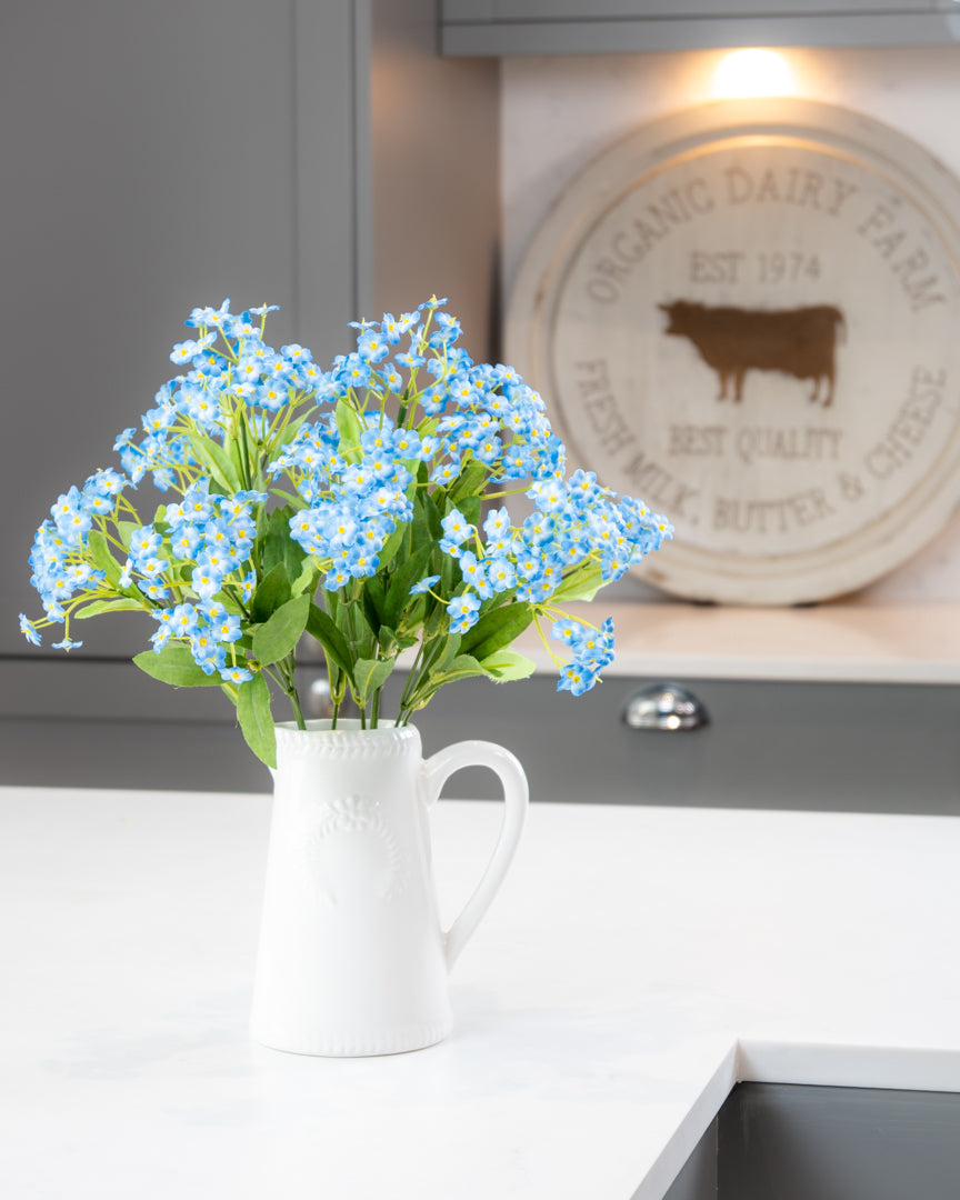 Forget Me Nots in Ceramic Jug