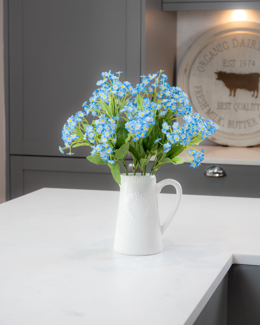 Forget Me Nots in Ceramic Jug