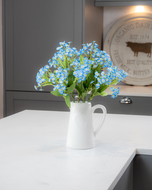 Forget Me Nots in Ceramic Jug