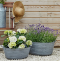 Load image into Gallery viewer, Outdoor Oval Metal Planter (2 sizes)
